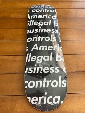 Supreme Skateboard Deck Black White Script Illegal Business Controls America